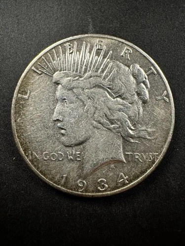 1934-S Peace Silver Dollar Better DateCirculated VG/F Details–San Francisco Mint