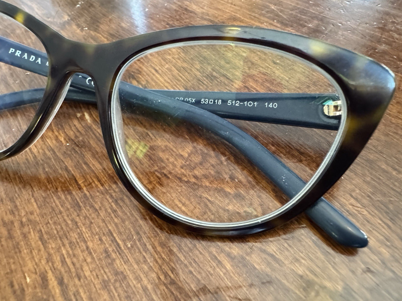 Prada PR 05XV cat-eye eyeglasses in a Havana/tortoiseshell color. Used thumbnail 3