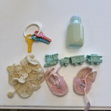Antique Baby Booties, Bottle, And Pacifiers