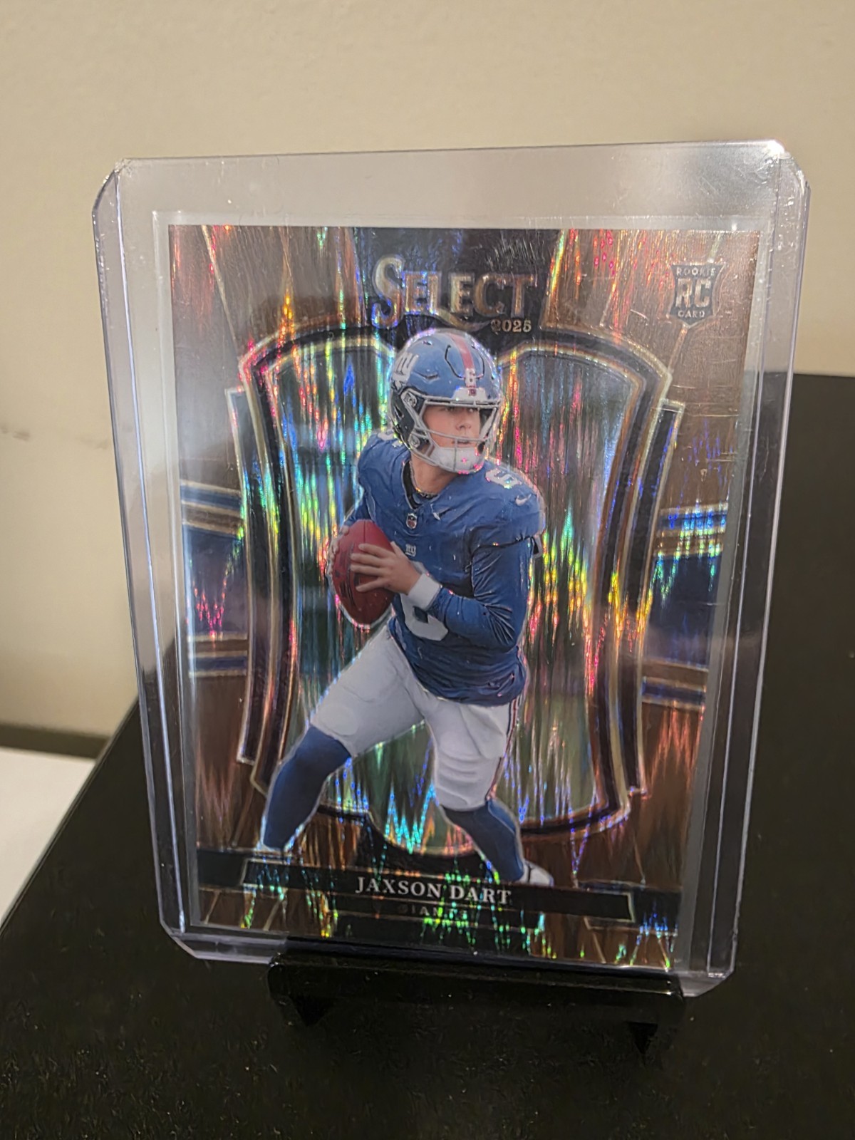 2025 Select Jaxson Dart Premier Level Copper Shock Prizm /899 (RC)