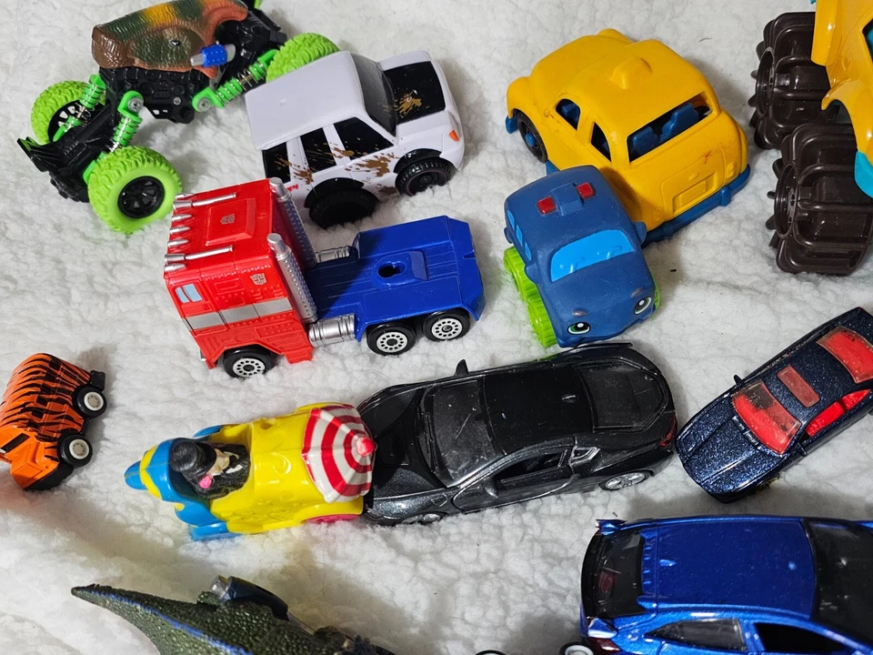 (Lot of 17) Boys Toys Cars Optimus Prime Penguin Dinosaurs Goofy Train etc. - Image 3 of 4