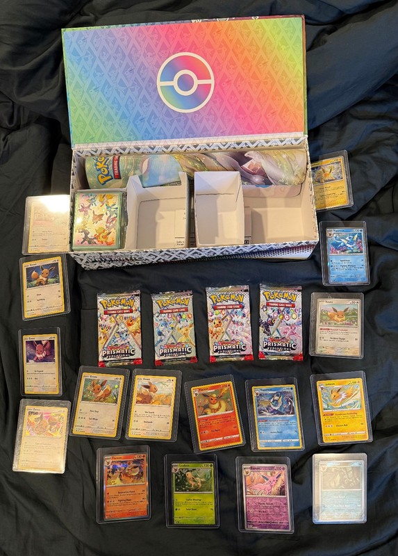 Pokémon TCG Prismatic Evolutions Super Premium Collection Box + 4 Sealed Packs
