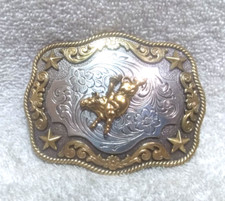 Nocona Silver Gold Bull Rider Buckle Gold Texas Stars Flower Filigree Mint  