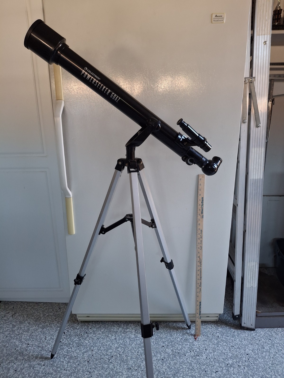 Celestron PowerSeeker 60AZ Telescope, and a Amazon 60in Ligh