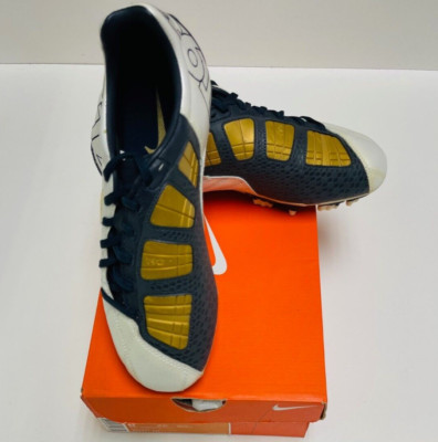 Nike Jr. Total90 Shoot III Kids L-FG Kids Soccer Shoes White-Dark Blue-Gold