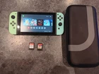 Nintendo Switch console 2 games and carrying case