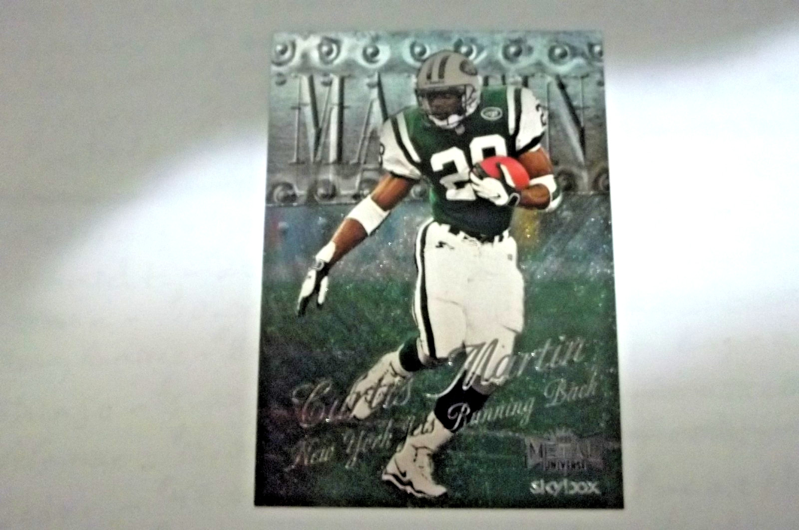 1999 Skybox Metal Universe Curtis Martin #64