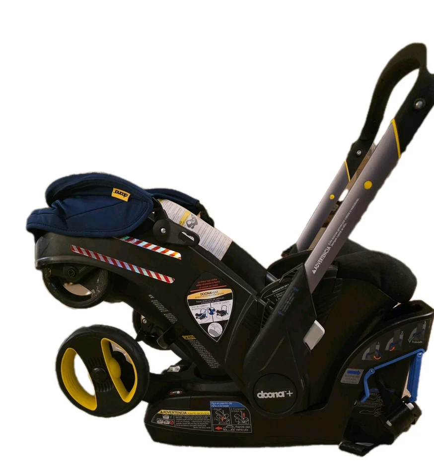 Cochecito convertible Doona, dosel azul oscuro con asiento negro Foto 2 de 4