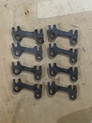 1969 Ford Boss Cleveland Pushrod Guide Plates. Used, good condition. 8 plate set