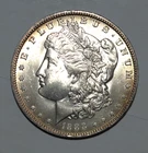 Morgan Dollar:  1888 O AU+ Better date  Medium Round O Edge Toning