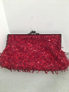 red sparkly evening bag