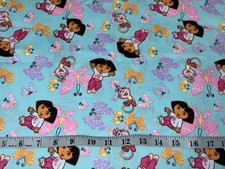 NEW Dora with Butterflie 100% Cotton Sold By 1/2 Yard 18"L x 44"W More Available