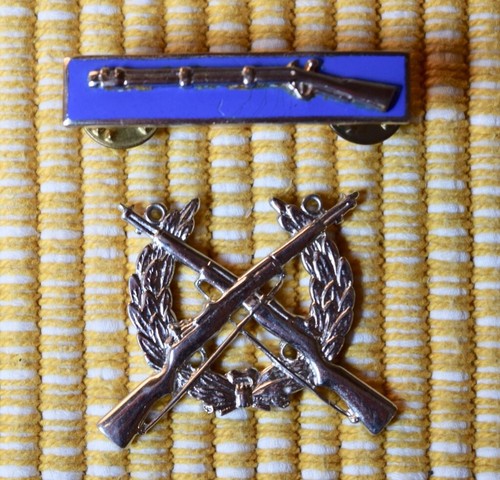 Two Vintage US Military Markman Rifle Pins, badges