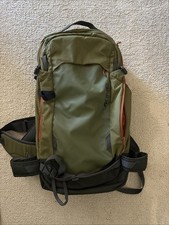 Dakine Poacher 22L snowboard ski backpack, utility green.