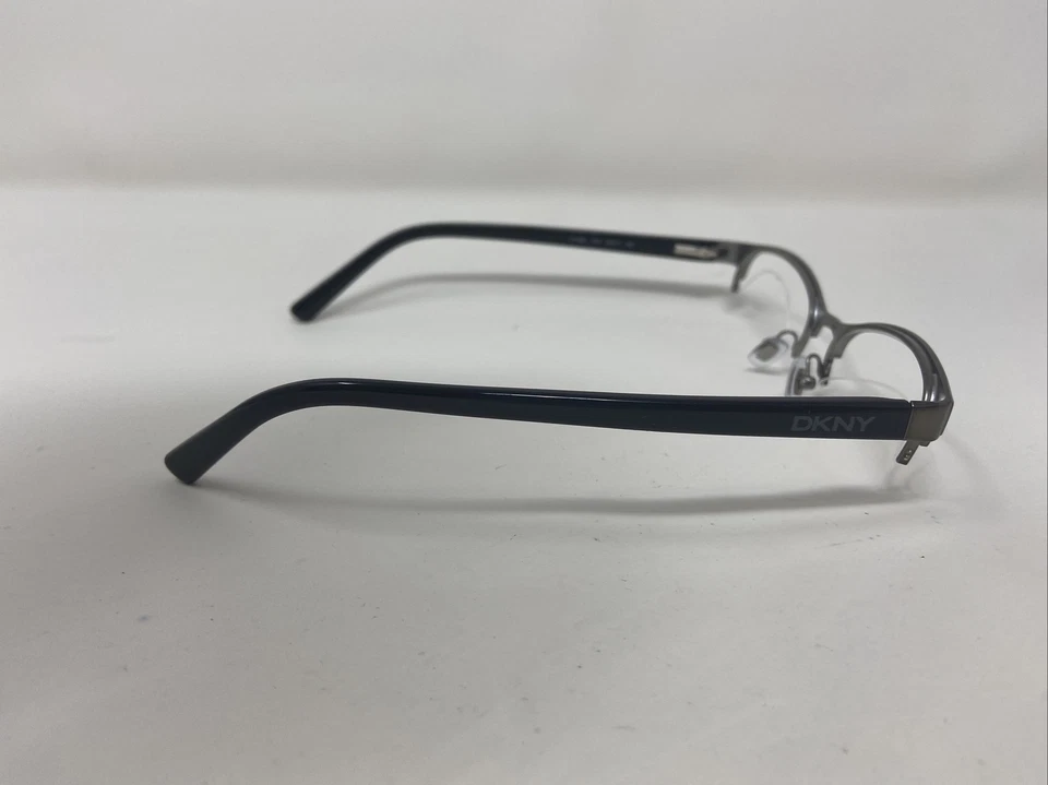 MARCO DE GAFAS DKNY DY5642 1014 52/17/140 NEGRO/PLATEADO MEDIO BORDE YU65 Foto 3 de 4