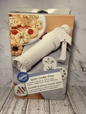 WILTON Spritz Cookie Press Includes 12 Different Disc Designs Open Box