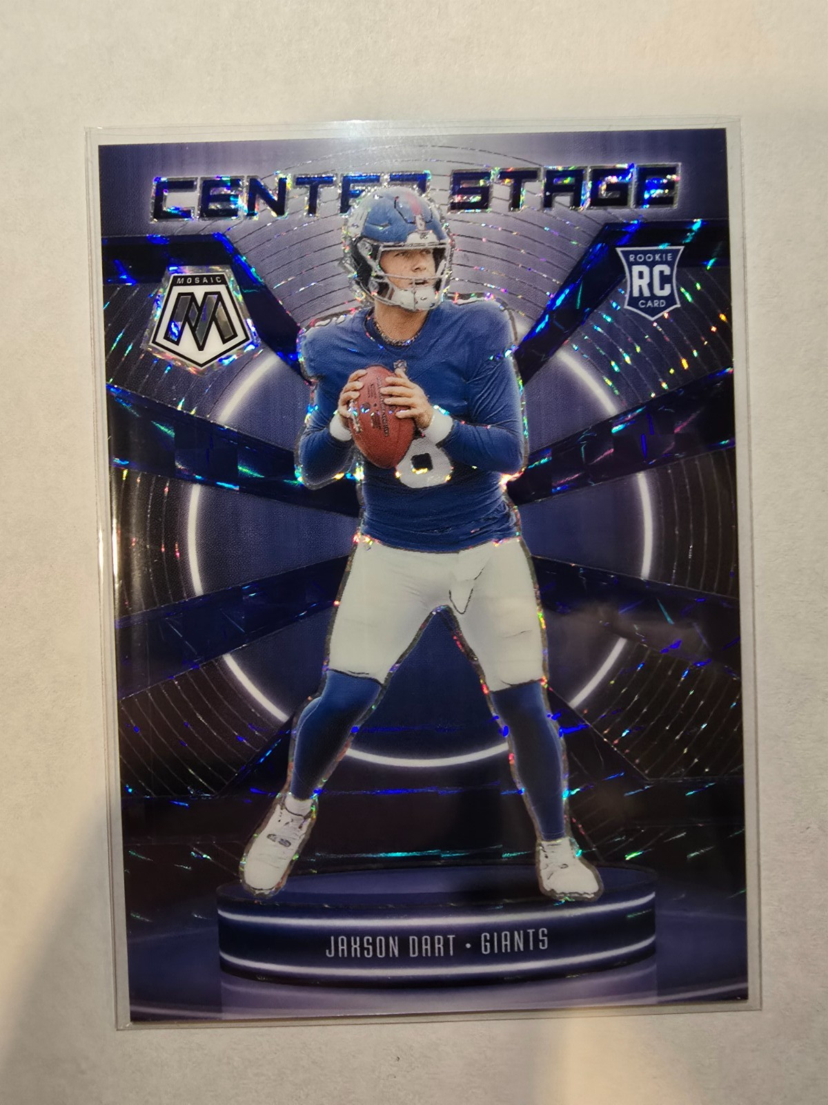 2025 Panini Mosaic - Jaxson Dart #7 Center Stage Blue Prizm (RC) /99