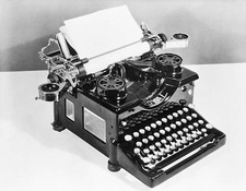 Royal typewriter outfitted with protographer a device two make thre- Old Photo 1 thumbnail