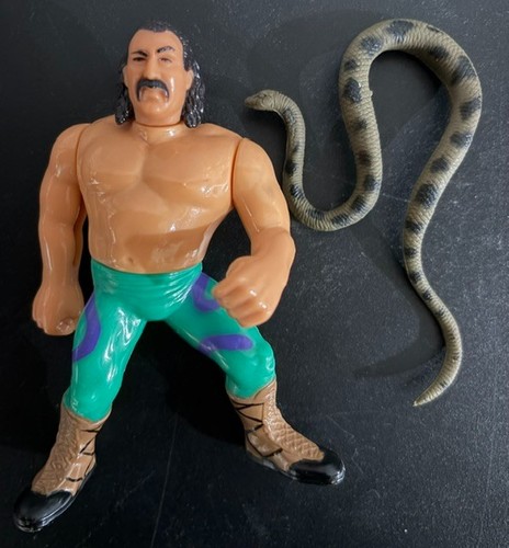 WWF Hasbro JAKE THE SNAKE ROBERTS figure with SNAK...