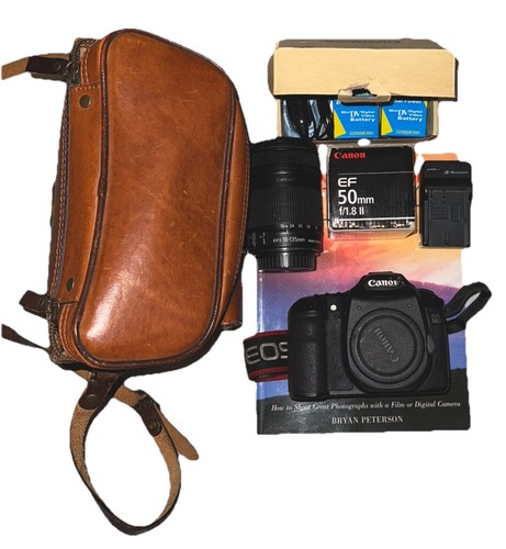 Canon EOS 50D 15.1MP DSLR Camera with EFS 18-135mm And EF 50mm