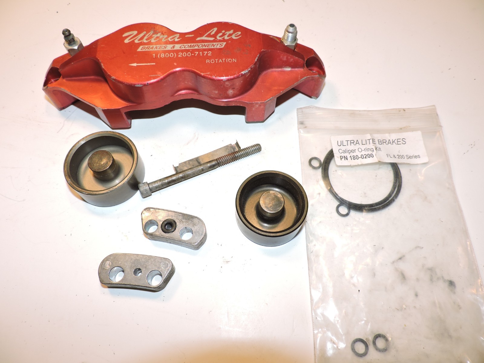 Various Red Devil brand brake caliper parts & pistons NASCAR Late Model