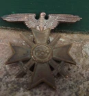 TWO old World War 2 badges - one with the date 1939