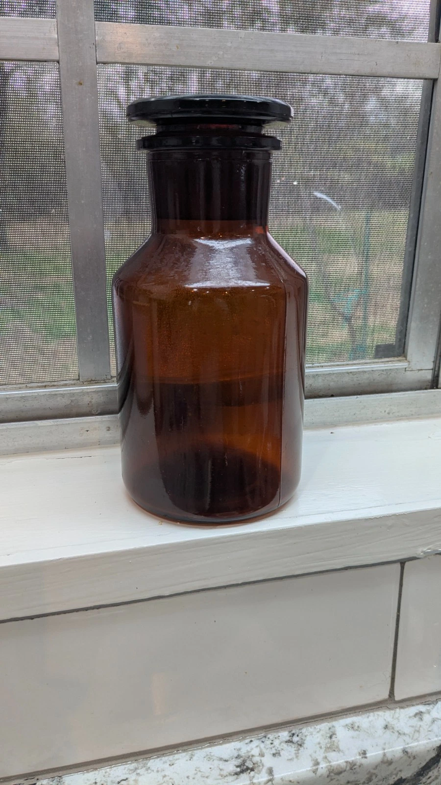 vintage amber glass apothecary jar With Glass Lid 8” Tall