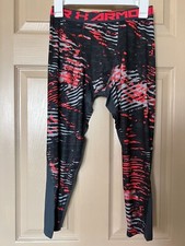 New W/tags Under Armour&nbsp; Boys YLG/G orange/black Heat gearCoupe Ajustee