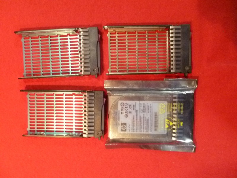HP  146GB 10K  2.5" SAS Hard Drive in Caddy New Sealed   +   3 spare caddies.