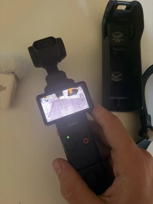 Osmo Pocket 3 pack avec batterie, sangle, micro et boite - Photo 1/4