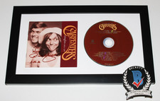 RICHARD CARPENTER SIGNED FRAMED CARPENTERS SINGLES CD COVER ALBUM BECKETT COA