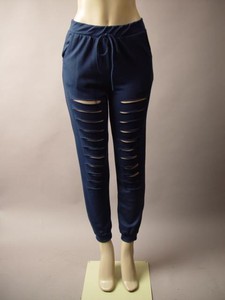 torn track pants