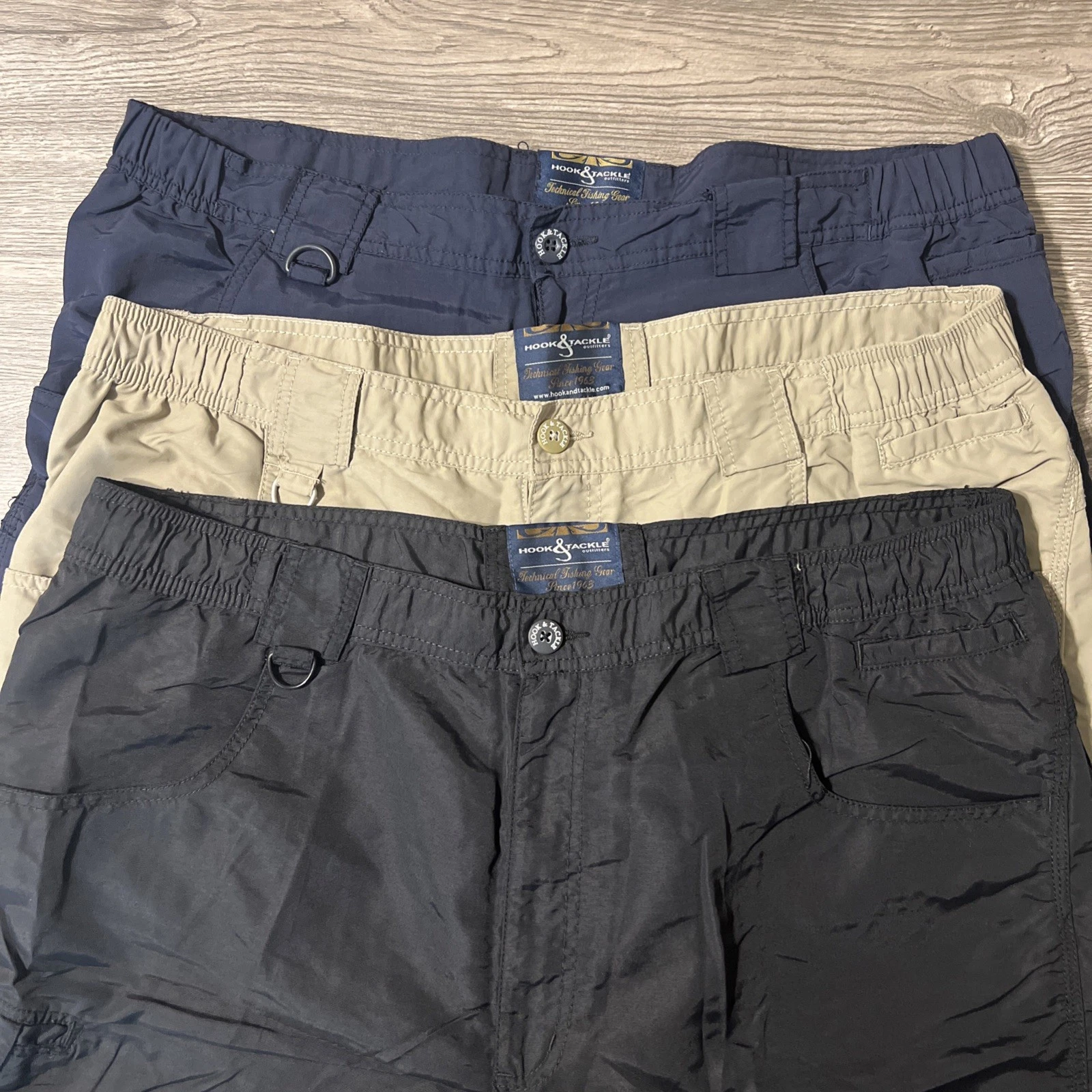 Lot Of 3 Hook And Tackle Navy/Tan/Black Lightweight Cargo Fishing Shorts Sz 42x8
Opens in a new wind