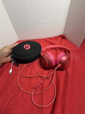 Hot pink Beats by Dr. Dre Solo headphones with case missing piece. Works