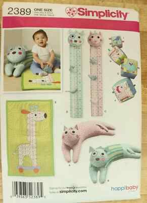 Kitty Cat pillow, Grow chart, Blocks, Giraffe blanket. Simplicity 2389 Uncut