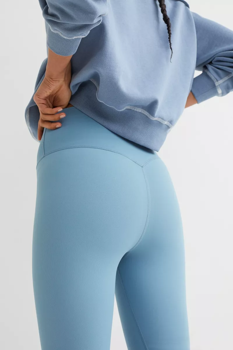 H&M SHAPEMOVE HIGH WAIST SHAPING SPORTS TIGHTS PASTEL BLUE M