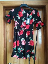 Pretty Little Thing black flowePolka Ruched hem Dress size 6 bnwt 