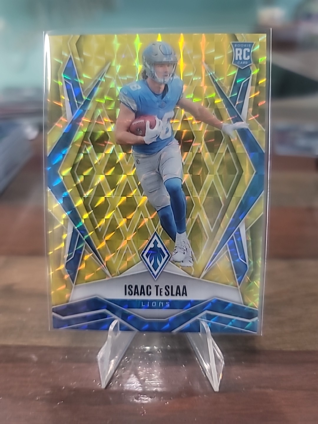 2025 Panini Phoenix - Isaac TeSlaa #189 Yellow Pyramids #'d /185 Lions (RC)