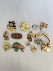 vintage costume jewelry brooches featuring various motifs Lot Of 15
