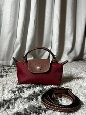 Longchamp Le Pliage XS mini handbag/shoulder bag with red nylon leather trim.