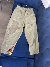 Kapital's early smiling face destroyed patch pants