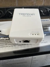 Four TPL-401E Powerline Internet Adapters.