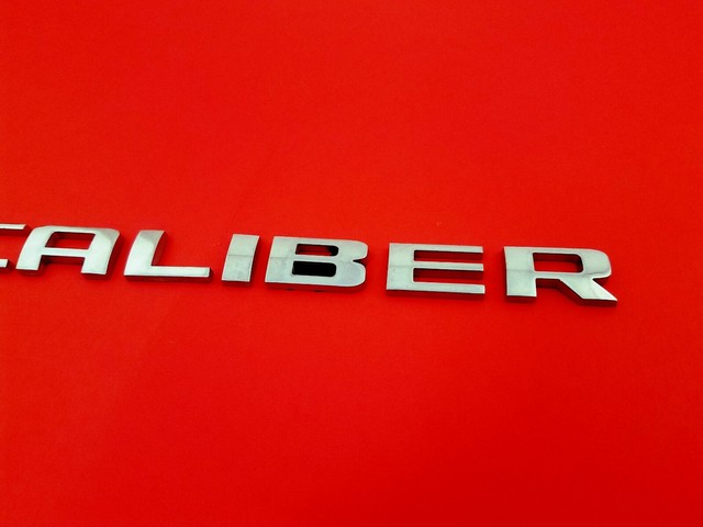 Dodge caliber эмблема