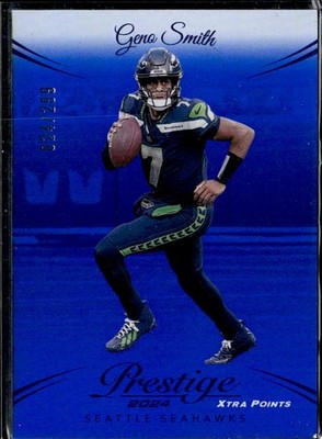 2024 Panini Prestige #265 Geno Smith Blue Premium Xtra Points #/299