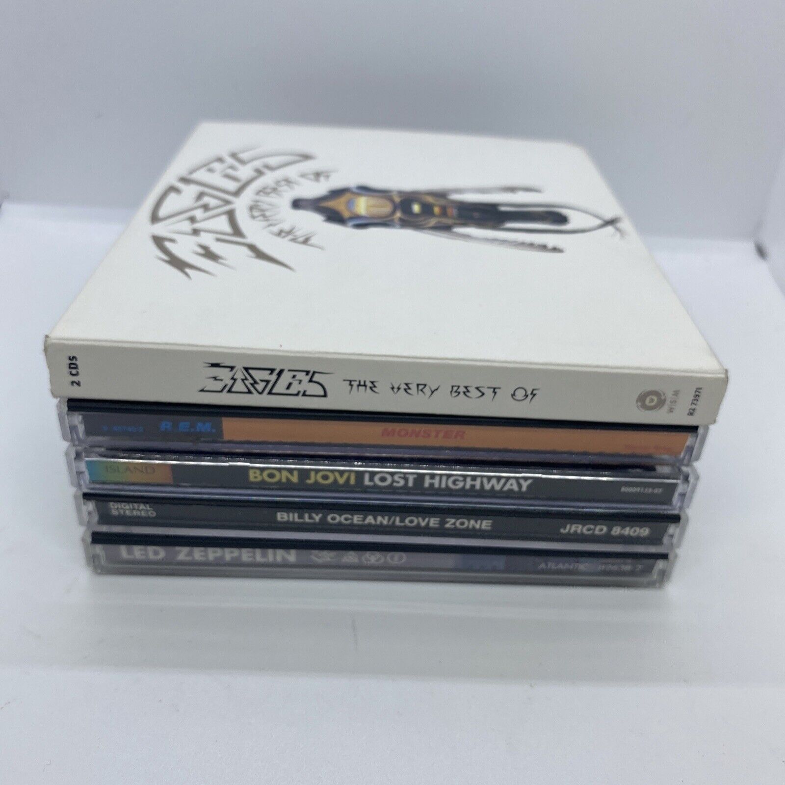Lot of 5 - Music CD’s - Eagles, Led Zepplin, Bon Jovi, REM, Billy Ocean
