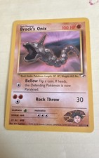brock's onix pokemon card 2000 Gym Heroes #021/132 1st Edition Price Guide Mint / near mint condition trading card BROCK helps ONIX while JASMINE