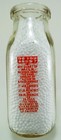 SPOKANE, WASHINGTON HALF-PINT MILK BOTTLE - ODD VARIANT w/ORANGE PYRO  - TSPHP — photo 3