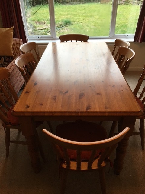 Large pine dining table and 8 chairs
