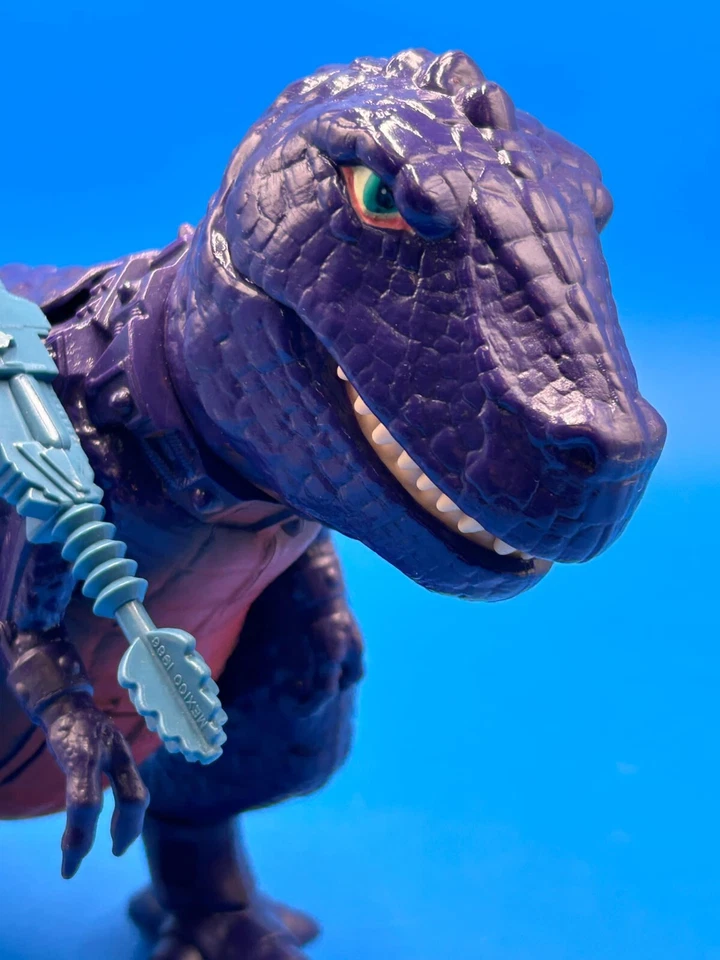 Figura de acción de colección Masters of the Universe (He-Man) Tyrantisaurus Rex cerca de M Foto 2 de 4