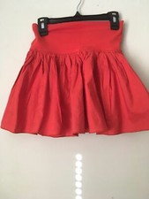 The Children  s Place 100 cotton ORANGE RUFFLED SKIRT. Size 6. shorts underneath